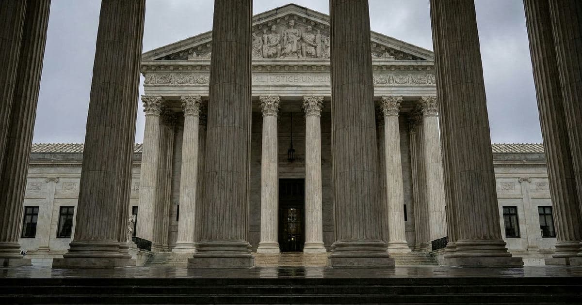 Classical marble columns of a government building under overcast sky, conveying legal authority.